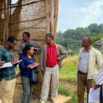 1. HU staff interviewing the coffee processing association